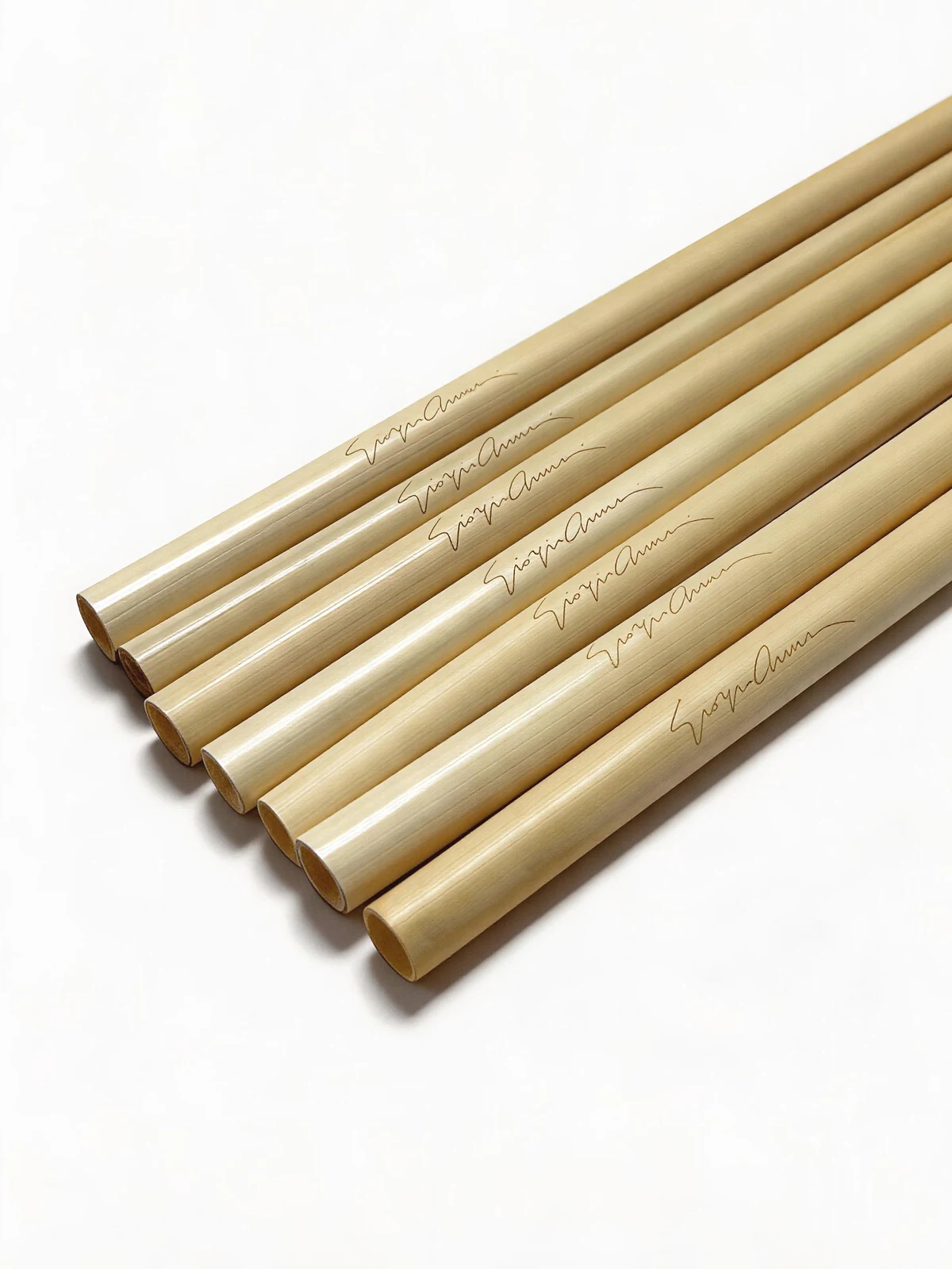 Seven natural reed straws with signature laser engraving